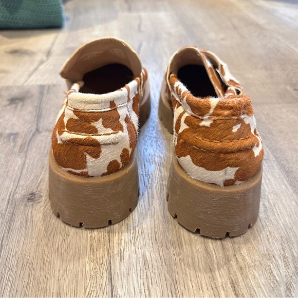 Steve Madden Lawrence Cow Print Lug Sole Loafers - Picture 3 of 6